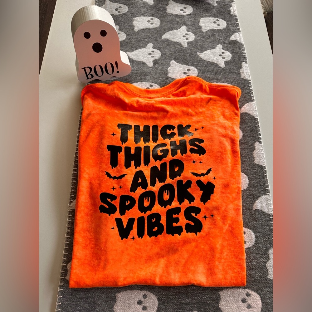 Halloween thick thighs and spooky vibes tshirt. Brand new size M (unisex)